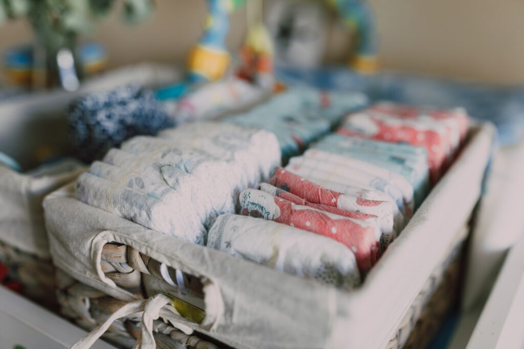 stack of diapers in a basket
