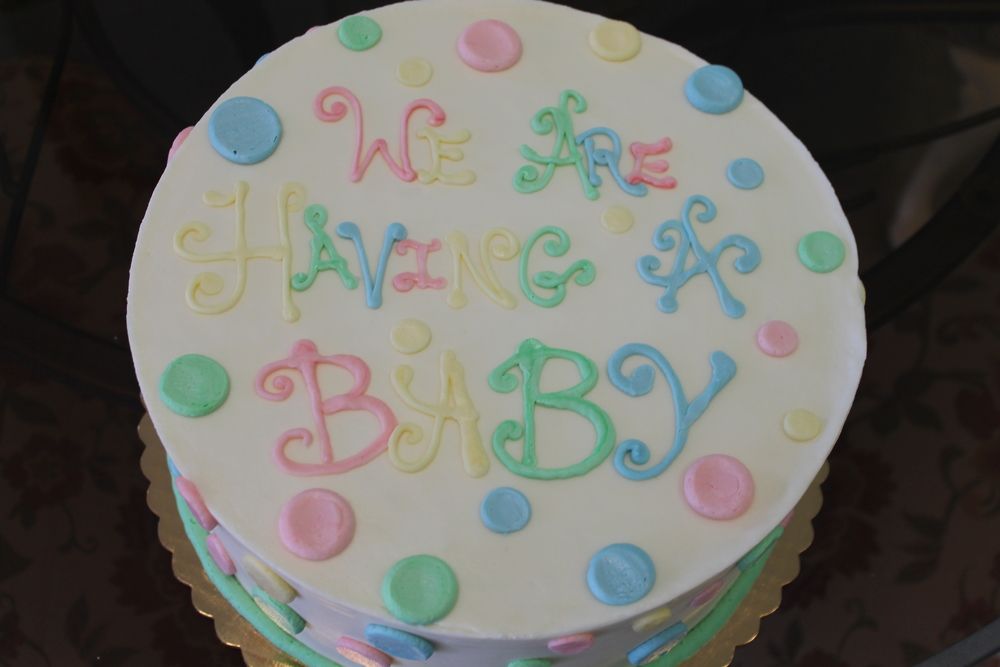 pregnancy announcement cake